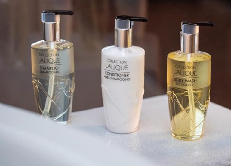 Collection Lalique shampoo, conditioner and body wash pump bottles