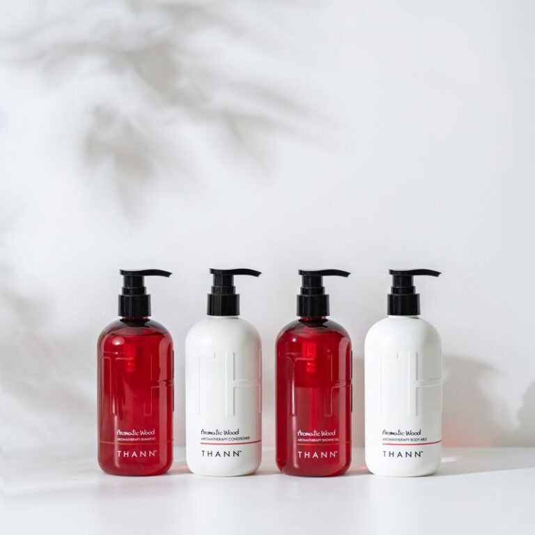THANN Aromatic Wood pump dispensers in red and white
