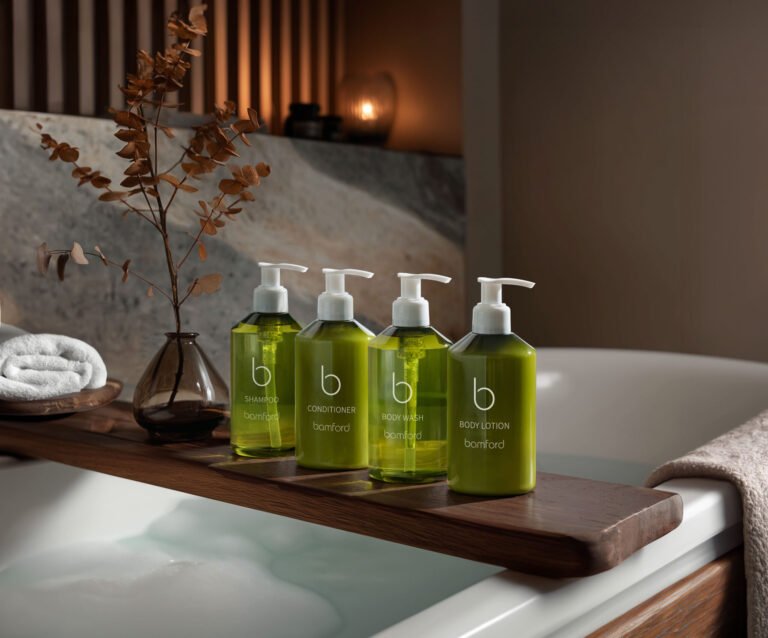 Bamford pump bottles on a wooden bath tray