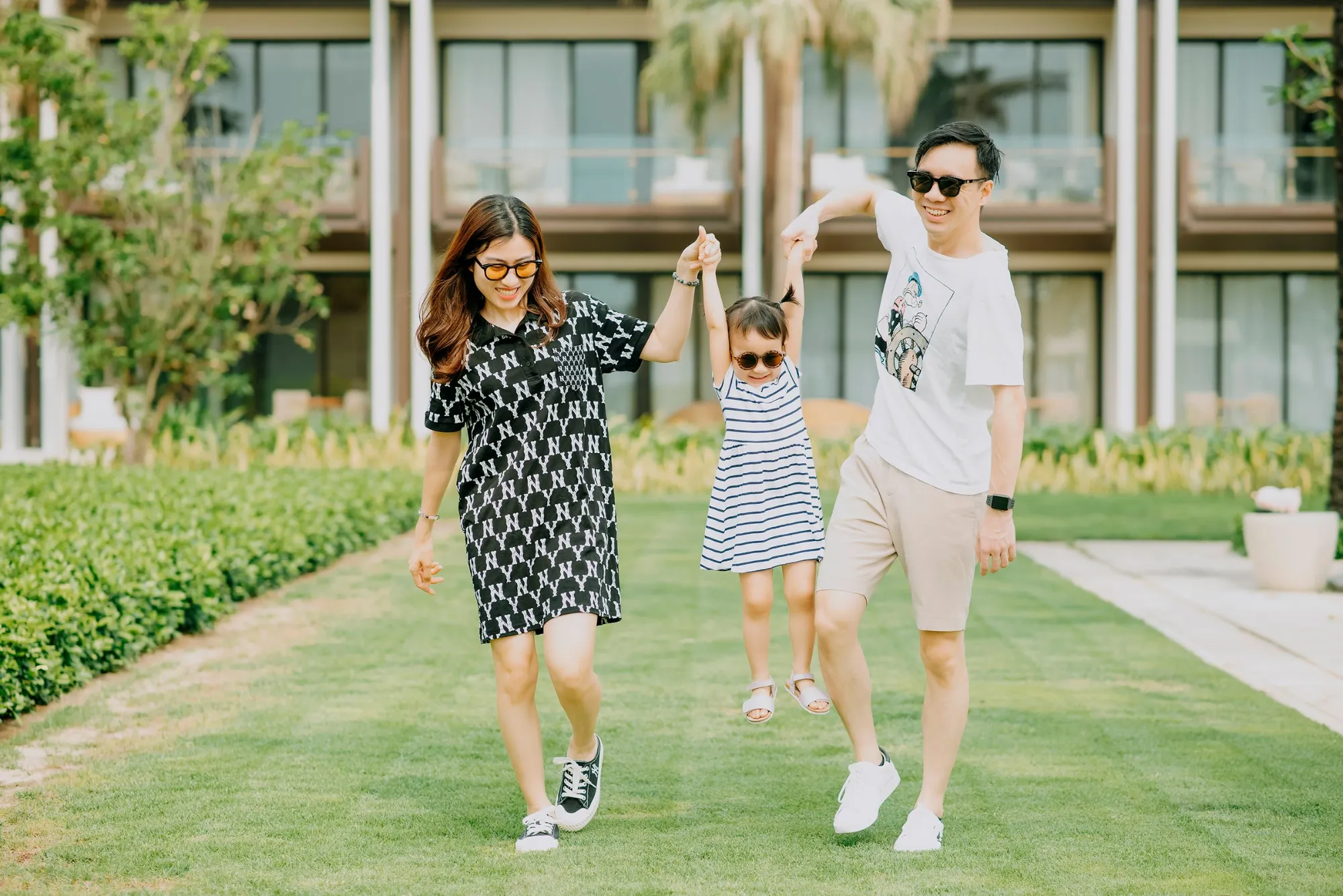 Happy family enjoying a stay at a resort hotel
