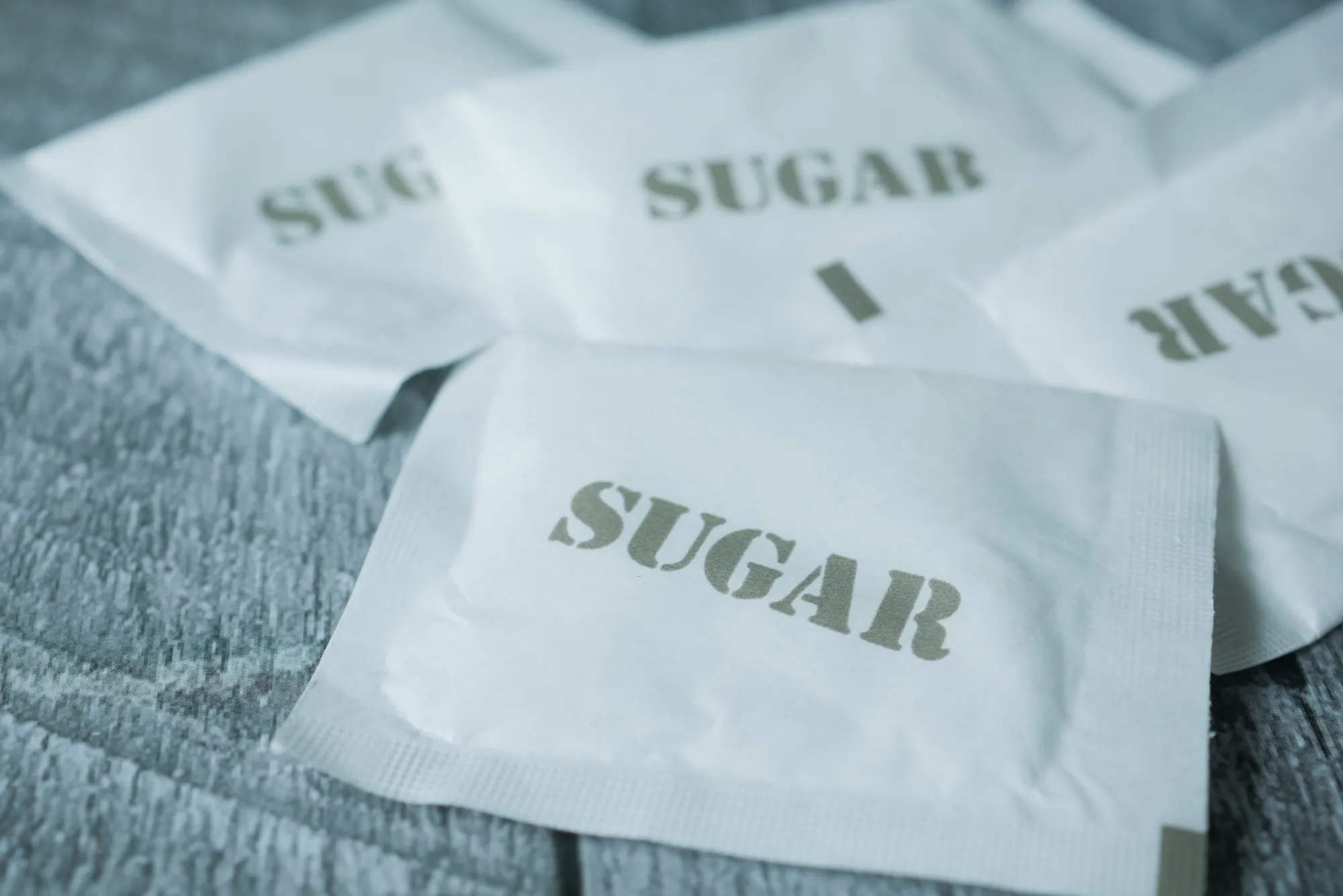 Sugar sachets on a cafe table