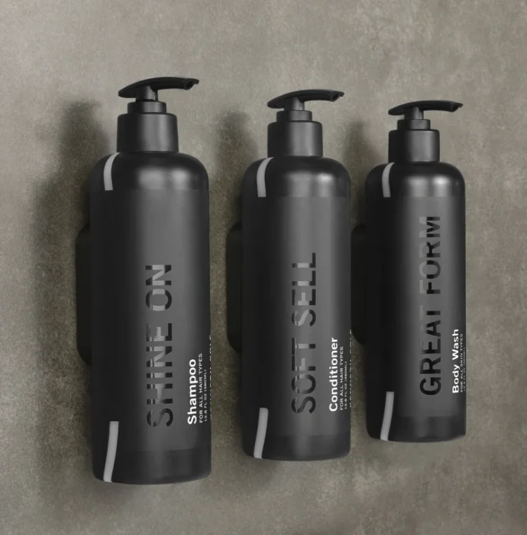 Kenneth Cole Shine On shampoo, Soft Sell conditioner and Great Form body wash bottles